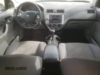 2006 Ford Focus S with VIN 1FAHP37N76W180039, listed as a Copart auction lot 58328565 with 220,696 mi miles and Salvage title. Bid and sale history available at DreamBid. Image 8.