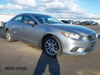 2015 Mazda 6 i Sport with VIN JM1GJ1U57F1224263, listed as a IAAI auction lot 41544381 with 187,447 mi miles and . Bid and sale history available at DreamBid. Image 1.
