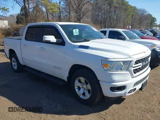 2024 Ram 1500 Big Horn with VIN 1C6SRFFT1RN142853, listed as a IAAI auction lot 41722121 with 16,566 mi miles and . Bid and sale history available at DreamBid. Image 1.