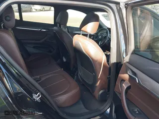 2018 BMW X2 xDrive28i with VIN WBXYJ5C33JEF78378, listed as a IAAI auction lot 40577868 with 45,592 mi miles. Bid and sale history available at carsss.com. Image 8.