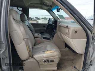 2004 Chevrolet Suburban LT with VIN 1GNEC16Z94J240907, listed as a IAAI auction lot 41331786 with 148,246 mi miles. Bid and sale history available at carsss.com. Image 5.