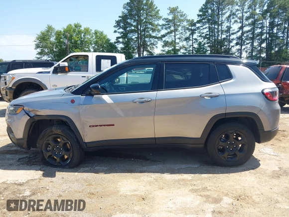 2023 Jeep Compass Trailhawk with VIN 3C4NJDDN3PT527995, listed as a IAAI auction lot 42218464 with 47,701 mi miles and . Bid and sale history available at DreamBid. Image 14.