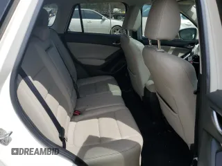 2015 Mazda CX-5 Grand Touring with VIN JM3KE4DY0F0458719, listed as a Copart auction lot 52960365 with 128,372 mi miles and Salvage Title. Bid and sale history available at DreamBid. Image 11.