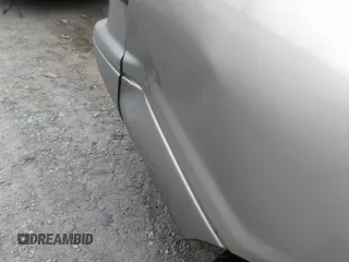 2001 Toyota Camry CE z VIN 4T1BG22K11U803209, wystawiony jako IAAI lot #40770527 z przebiegiem 210 611 mil mil oraz . Historia ofert i sprzedaży dostępna na DreamBid. Obrazek 6.