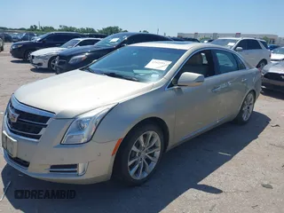 2016 Cadillac XTS Luxury Collection with VIN 2G61M5S32G9101153, listed as a IAAI auction lot 42523917 with 131,054 mi miles and . Bid and sale history available at DreamBid. Image 2.