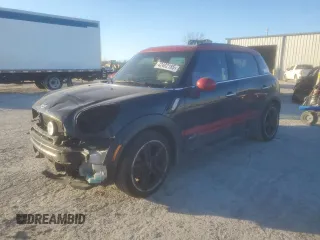 2015 MINI Countryman John Cooper Works with VIN WMWXD1C5XFWS34732, listed as a Copart auction lot 42402185 with Not Provided miles and Salvage Title. Bid and sale history available at DreamBid. Image 1.