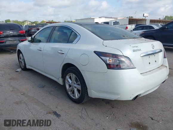 2014 Nissan Maxima SV with VIN 1N4AA5AP6EC446580, listed as a IAAI auction lot 42762381 with 184,665 mi miles and . Bid and sale history available at DreamBid. Image 3.