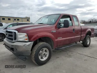 2004 Ford Super Duty F-250 XL with VIN 1FTNX21P84EA18957, listed as a Copart auction lot 85969144 with 129,407 mi miles and Salvage Title. Bid and sale history available at carsss.com. Image 1.
