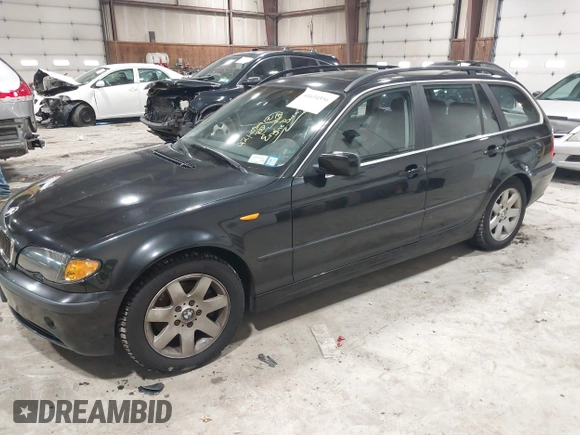 2004 BMW 3 Series 325xi with VIN WBAEP33464PF04602, listed as a IAAI auction lot 41634556 with 92,408 mi miles. Bid and sale history available at carsss.com. Image 2.