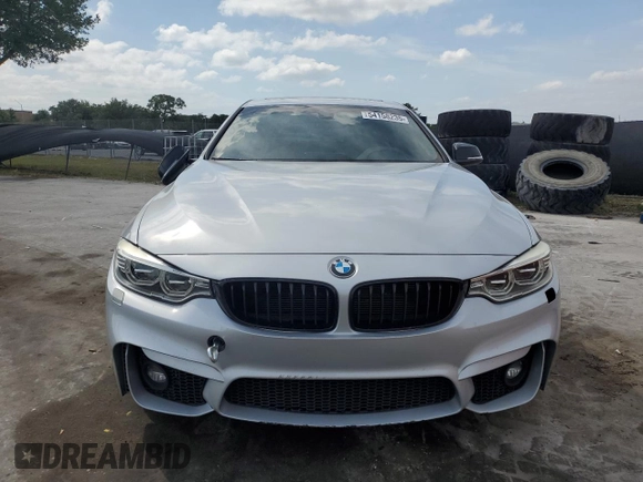 2015 BMW 4 Series 428i xDrive with VIN WBA4C9C55FD331210, listed as a Copart auction lot 54158235 with 88,372 mi miles and Salvage title. Bid and sale history available at DreamBid. Image 5.