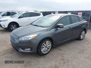 2018 Ford Focus Titanium with VIN 1FADP3J29JL232911, listed as a IAAI auction lot 41524078 with 90,764 mi miles and . Bid and sale history available at DreamBid. Image 17.