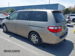 2005 Honda Odyssey EX-L with VIN 5FNRL38705B087733, listed as a IAAI auction lot 42165084 with 254,357 mi miles. Bid and sale history available at carsss.com. Image 3.