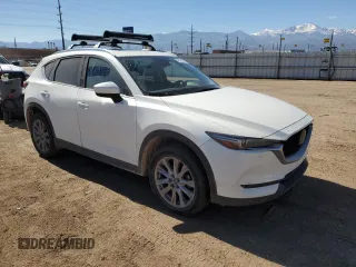 2019 Mazda CX-5 Grand Touring with VIN JM3KFBDM7K0632620, listed as a Copart auction lot 47870315 with 54,318 mi miles and Clean Title. Bid and sale history available at carsss.com. Image 4.