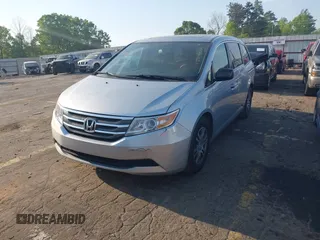 2013 Honda Odyssey EX-L with VIN 5FNRL5H6XDB084016, listed as a IAAI auction lot 42044300 with 156,296 mi miles and . Bid and sale history available at carsss.com. Image 19.