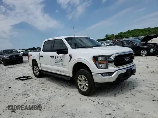 2023 Ford F-150 XL with VIN 1FTFW1E85PKG17275, listed as a Copart auction lot 57497155 with 34,379 mi miles and Salvage title. Bid and sale history available at DreamBid. Image 13.