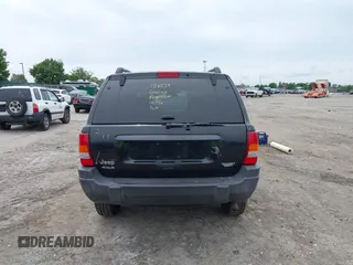2004 Jeep Grand Cherokee Laredo z VIN 1J4GW48S54C198115, wystawiony jako IAAI lot #42351240 z przebiegiem 189 416 mil mil oraz . Historia ofert i sprzedaży dostępna na DreamBid. Obrazek 17.