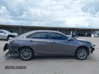2015 Toyota Camry XLE z VIN 4T1BF1FK8FU114881, wystawiony jako IAAI lot #42231368 z przebiegiem Nie podano mil oraz . Historia ofert i sprzedaży dostępna na DreamBid. Obrazek 14.
