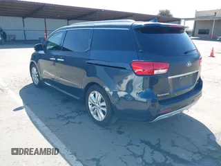 2016 Kia Sedona SX-L with VIN KNDME5C15G6083811, listed as a IAAI auction lot 41932863 with 124,218 mi miles. Bid and sale history available at carsss.com. Image 3.