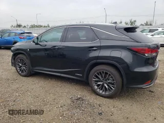 2021 Lexus RX with VIN 2T2YGMDA4MC065143, listed as a Copart auction lot 62223283 with 27,636 mi miles. Bid and sale history available at carsss.com. Image 2.