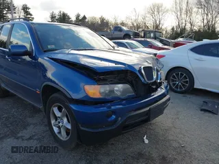 2001 BMW X5 4.4i with VIN WBAFB33501LH24719, listed as a IAAI auction lot 41055076 with 126,530 mi miles. Bid and sale history available at carsss.com. Image 14.