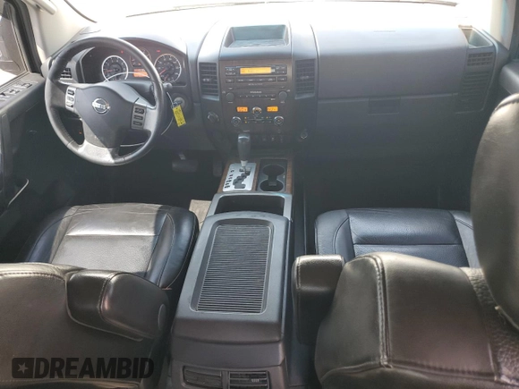 2012 Nissan Titan SV with VIN 1N6BA0EC5CN324882, listed as a Copart auction lot 62551995 with 189,385 mi miles and Salvage title. Bid and sale history available at DreamBid. Image 8.