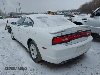 2013 Dodge Charger SXT with VIN 2C3CDXHG6DH643261, listed as a IAAI auction lot 41612150 with 164,181 mi miles. Bid and sale history available at carsss.com. Image 3.