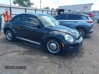 2012 Volkswagen Beetle 2.5L with VIN 3VWJX7AT1CM646664, listed as a IAAI auction lot 42531165 with 67,189 mi miles and . Bid and sale history available at DreamBid. Image 1.