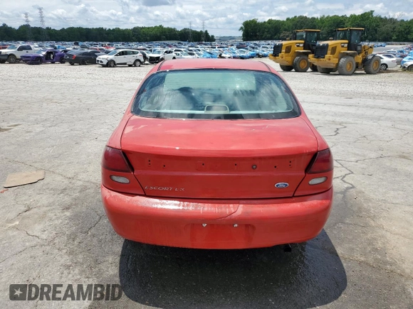 1997 Ford Escort LX with VIN 1FALP13P2VW128399, listed as a Copart auction lot 58775365 with 85,434 mi miles and Salvage title. Bid and sale history available at DreamBid. Image 6.