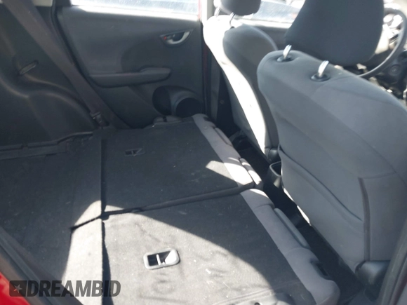 2010 Honda Fit with VIN JHMGE8H2XAC010621, listed as a IAAI auction lot 41683885 with 999,999 mi miles. Bid and sale history available at carsss.com. Image 8.