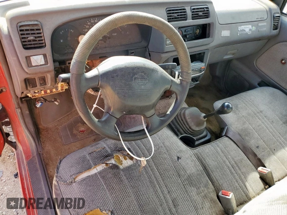 1998 Nissan Frontier XE with VIN 1N6DD21S4WC328785, listed as a Copart auction lot 62424085 with Not provided miles and Salvage title. Bid and sale history available at DreamBid. Image 8.