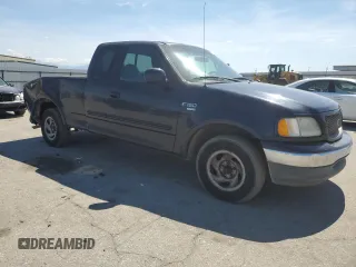 2000 Ford F-150 XL with VIN 1FTRX17L0YKA29295, listed as a Copart auction lot 50719525 with 0 mi miles and Salvage Title. Bid and sale history available at carsss.com. Image 4.