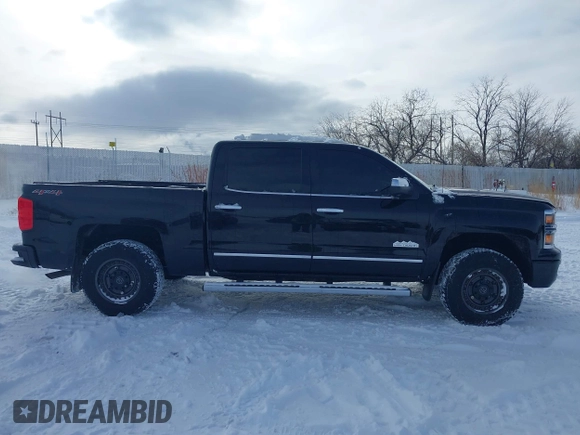 2015 Chevrolet Silverado 1500 High Country with VIN 3GCUKTEC0FG148198, listed as a IAAI auction lot 41493933 with 164,453 mi miles and . Bid and sale history available at DreamBid. Image 13.