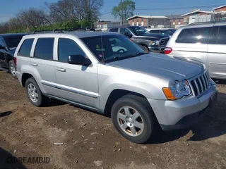 2010 Jeep Grand Cherokee Laredo with VIN 1J4PR4GK5AC161442, listed as a IAAI auction lot 41939994 with 137,376 mi miles. Bid and sale history available at carsss.com. Image 1.