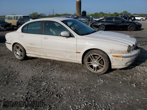 2005 Jaguar X-Type z VIN SAJWB52D55XE26531, wystawiony jako Copart lot #50909445 z przebiegiem 158 861 mil mil oraz Szkoda całkowita • Salvage title. Historia ofert i sprzedaży dostępna na DreamBid. Obrazek 4.