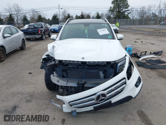 2022 Mercedes-Benz GLB 250 z VIN W1N4M4HB7NW173675, wystawiony jako IAAI lot #41744858 z przebiegiem 20 909 mil mil oraz . Historia ofert i sprzedaży dostępna na DreamBid. Obrazek 13.