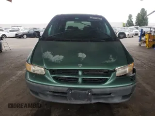 1999 Dodge Caravan with VIN 2B4GP25R8XR200747, listed as a Copart auction lot 58273225 with 182,147 mi miles and Salvage title. Bid and sale history available at DreamBid. Image 5.