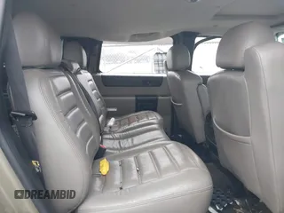 2005 Hummer H2 SUV with VIN 5GRGN23U35H130615, listed as a IAAI auction lot 41085325 with 138,393 mi miles. Bid and sale history available at carsss.com. Image 8.