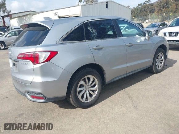2017 Acura RDX with VIN 5J8TB3H32HL019765, listed as a IAAI auction lot 41935355 with 128,704 mi miles. Bid and sale history available at carsss.com. Image 4.