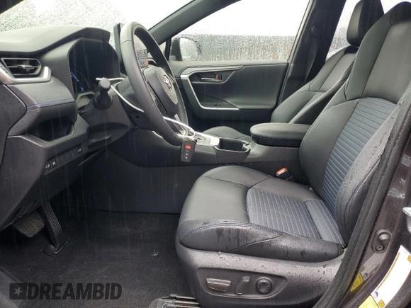 2023 Toyota RAV4 Hybrid XSE with VIN JTME6RFV5PJ037206, listed as a Copart auction lot 61597265 with 5,094 mi miles and Salvage title. Bid and sale history available at DreamBid. Image 7.