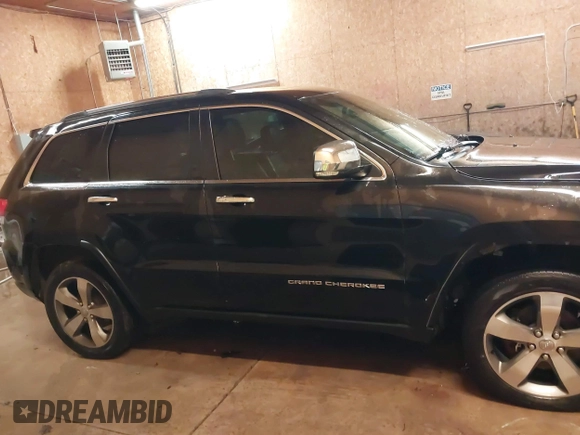 2015 Jeep Grand Cherokee Limited with VIN 1C4RJFBG8FC910133, listed as a IAAI auction lot 41289929 with 141,226 mi miles. Bid and sale history available at carsss.com. Image 13.