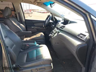 2013 Honda Odyssey Touring with VIN 5FNRL5H98DB085627, listed as a IAAI auction lot 41742702 with 117,899 mi miles. Bid and sale history available at carsss.com. Image 5.
