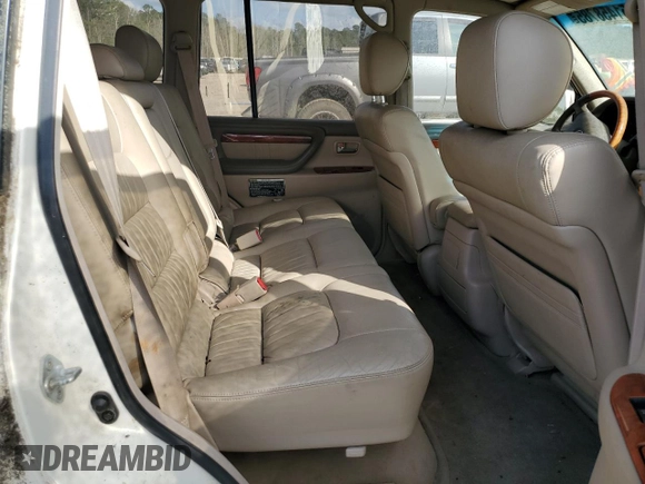2002 Lexus LX 470 z VIN JTJHT00W623517039, wystawiony jako Copart lot #51458785 z przebiegiem 219 906 mil mil oraz Tytuł czysty. Historia ofert i sprzedaży dostępna na DreamBid. Obrazek 11.