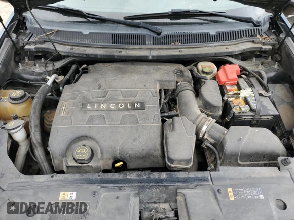2014 Lincoln MKT with VIN 2LMHJ5FKXEBL53440, listed as a Copart auction lot 49063455 with 207,928 mi miles and Salvage Title. Bid and sale history available at DreamBid. Image 12.