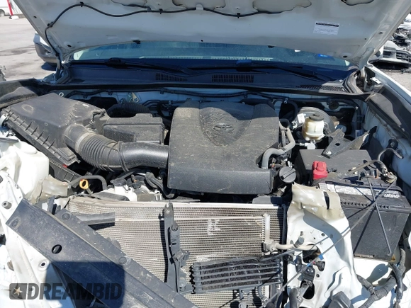 2018 Toyota Tacoma SR5 with VIN 5TFAZ5CN4JX056465, listed as a IAAI auction lot 41767848 with 71,532 mi miles and . Bid and sale history available at DreamBid. Image 10.