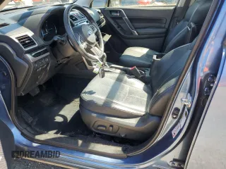 2017 Subaru Forester Touring with VIN JF2SJAWC2HH429099, listed as a Copart auction lot 64671135 with 104,709 mi miles and Salvage title. Bid and sale history available at DreamBid. Image 7.