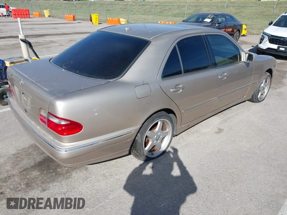 2001 Mercedes-Benz E-Class with VIN WDBJF65J61B251908, listed as a IAAI auction lot 41800893 with 187,178 mi miles. Bid and sale history available at carsss.com. Image 4.
