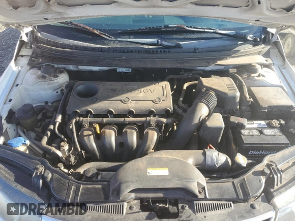 2010 Kia Forte EX z VIN KNAFU4A2XA5106480, wystawiony jako Copart lot #46790845 z przebiegiem 169 815 mil mil oraz Szkody całkowita. Historia ofert i sprzedaży dostępna na DreamBid. Obrazek 11.