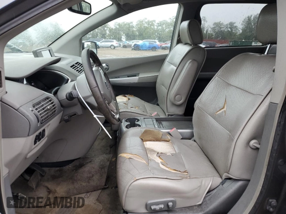 2007 Nissan Quest S with VIN 5N1BV28U27N137298, listed as a Copart auction lot 71587304 with 96,990 mi miles and Salvage Title. Bid and sale history available at carsss.com. Image 7.