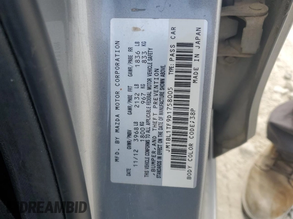 2013 Mazda 3 i SV with VIN JM1BL1TF9D1758005, listed as a Copart auction lot 54146045 with 218,099 mi miles and Salvage title. Bid and sale history available at DreamBid. Image 12.