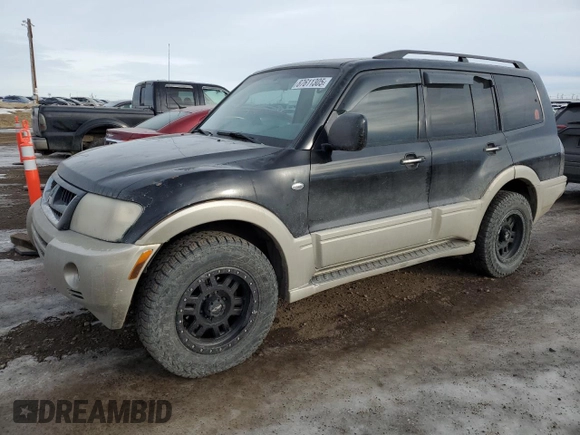 2003 Mitsubishi Montero z VIN JA4NW31SX3J600944, wystawiony jako Copart lot #87611305 z przebiegiem 215 693 mil mil oraz Czysty tytuł • Clean title. Historia ofert i sprzedaży dostępna na DreamBid. Obrazek 1.